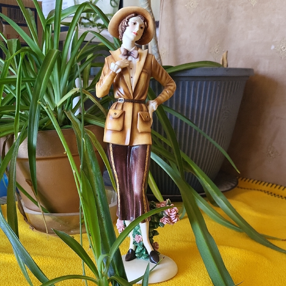 Vintage Style Figurine with Hat and Bow
